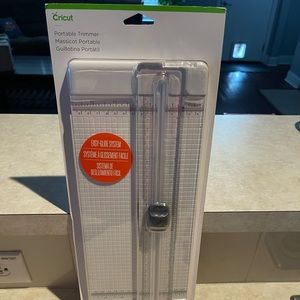 Cricut portable paper trimmer with swing out arm